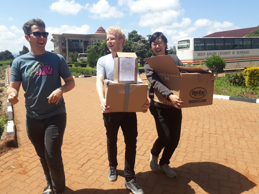 Damon Civin, Jan Jongboom and Gen-Tao Chiang with a lot of boxes